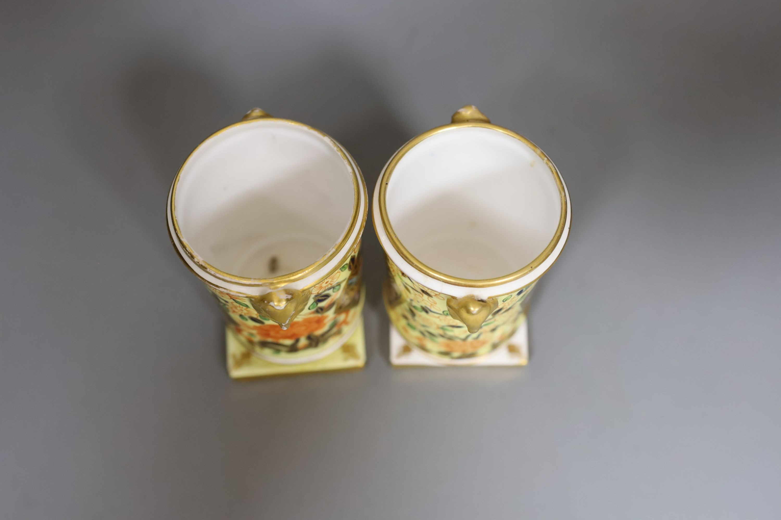 A pair of mid 19th century Crown Derby spill vases, 10cms high.